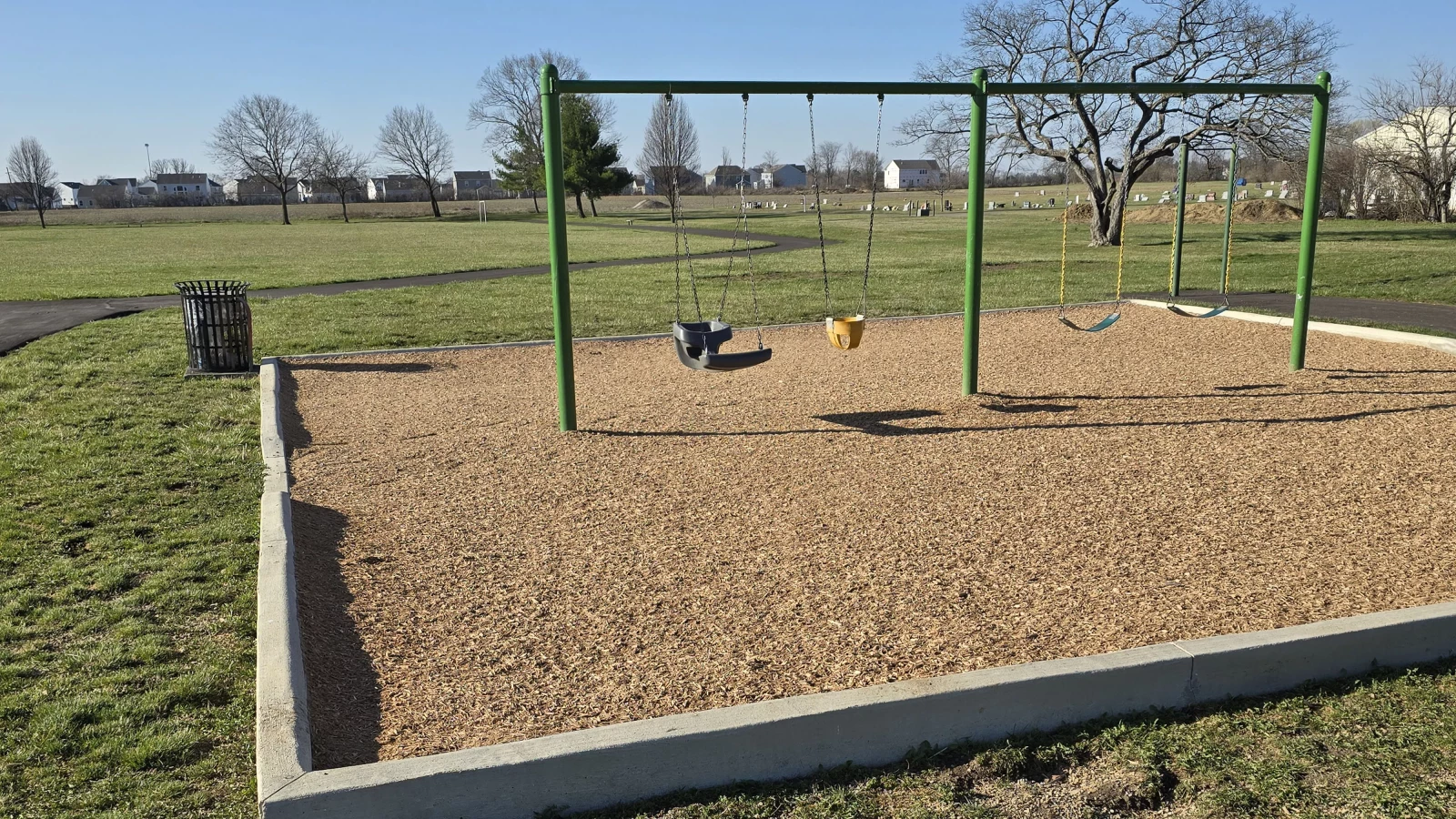 Photo of swings at Tanglebrook Park